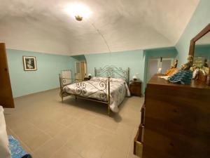 Ένα ή περισσότερα κρεβάτια σε δωμάτιο στο Dimora di nonno Livio