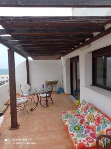 Balkón alebo terasa v ubytovaní Coqueto ático con vistas al mar