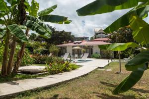 Zahrada ubytování Hôtel Les Bananiers
