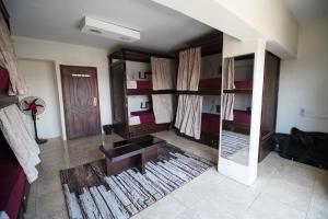 Ένα ή περισσότερα κρεβάτια σε δωμάτιο στο Castle Hostel
