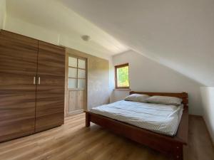 Posteľ alebo postele v izbe v ubytovaní SkyStudio