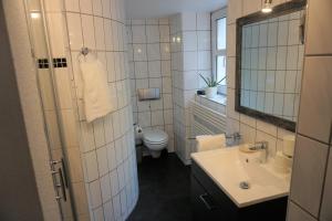 Koupelna v ubytování Hotel Jan van Werth