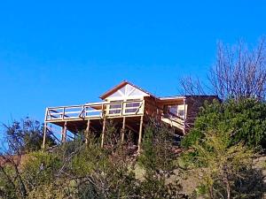 a house on the top of a hill at Forel in Toconey