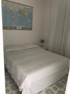 Ліжко або ліжка в номері Mansarda Marinello