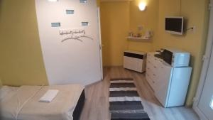 Kuchyň nebo kuchyňský kout v ubytování Bubble House - Apartmanok