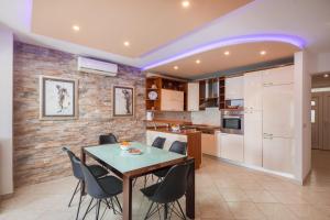 Kuchyň nebo kuchyňský kout v ubytování Beach Apartment Val