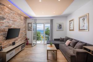 TV a/nebo společenská místnost v ubytování Beach Apartment Val