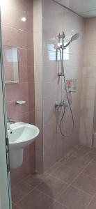 a bathroom with a shower and a sink at Къща, стаи за гости Мери in Chernomorets +17 photos
