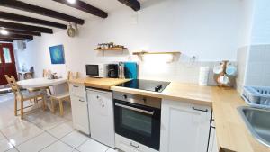 a kitchen with a sink and a counter top at Studio Tony in Dubrovnik