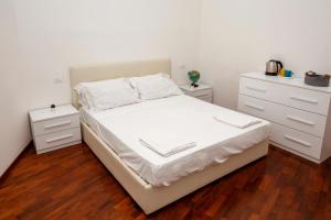 Postel nebo postele na pokoji v ubytování Mercadante Guest House