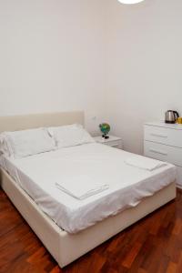 Postel nebo postele na pokoji v ubytování Mercadante Guest House