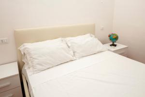 Postel nebo postele na pokoji v ubytování Mercadante Guest House