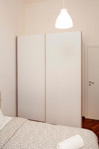 Postel nebo postele na pokoji v ubytování Mercadante Guest House