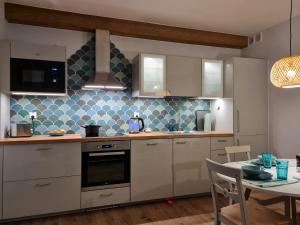 A kitchen or kitchenette at Cztery Wody