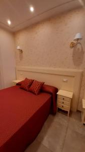 Postel nebo postele na pokoji v ubytování B&B Orchidea