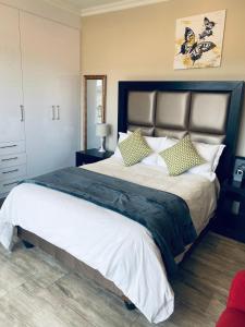 Postel nebo postele na pokoji v ubytování RNB Guesthouse