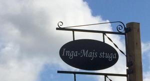 Majutusasutuses Inga-Majs stuga olev sertifikaat, autasu, silt või muu dokument
