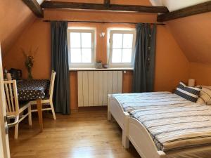 Postel nebo postele na pokoji v ubytování Gästezimmer Adenau