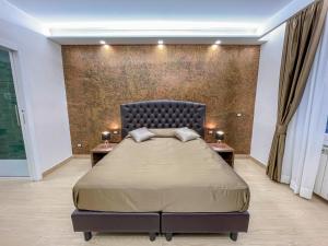Postel nebo postele na pokoji v ubytování B&B Le Ninfee