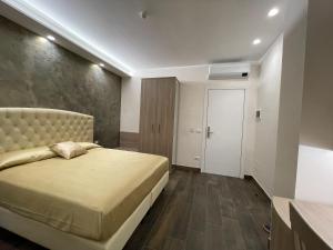 Postel nebo postele na pokoji v ubytování B&B Le Ninfee