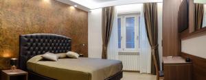 Postel nebo postele na pokoji v ubytování B&B Le Ninfee