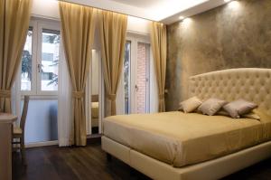 Postel nebo postele na pokoji v ubytování B&B Le Ninfee