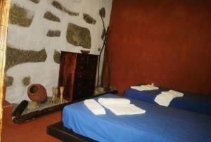 Postelja oz. postelje v sobi nastanitve Village Minhoure