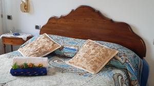 Postel nebo postele na pokoji v ubytování B&B Fontanella