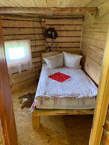 Postel nebo postele na pokoji v ubytování Садиба «Під Горбом»