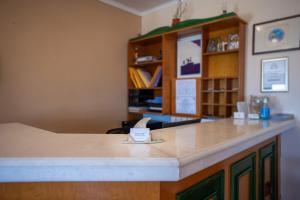 Kuchyňa alebo kuchynka v ubytovaní Kaliviani Traditional Hotel