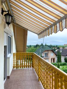 A balcony or terrace at Piroska Apartment
