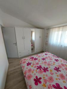 Postel nebo postele na pokoji v ubytování Apartman Ana