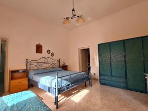 Postel nebo postele na pokoji v ubytování Villa Cino
