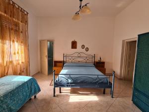Postel nebo postele na pokoji v ubytování Villa Cino