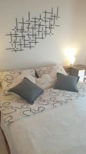 Postel nebo postele na pokoji v ubytování Apartman Lusi