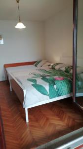 Postel nebo postele na pokoji v ubytování Apartment Pergola