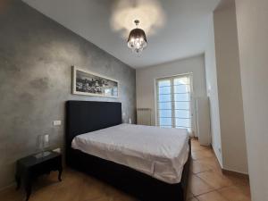 Posteľ alebo postele v izbe v ubytovaní Casa Maresole a Marcelli di Numana