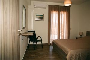 Postel nebo postele na pokoji v ubytování Seastone Villas