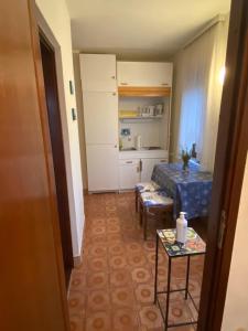Kuchyň nebo kuchyňský kout v ubytování Apartments Stella-Dora