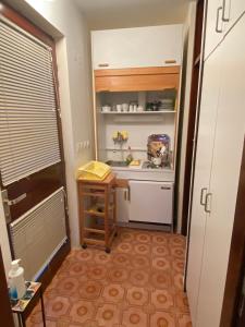 Kuchyň nebo kuchyňský kout v ubytování Apartments Stella-Dora