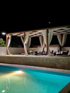 Afbeelding uit fotogalerij van Oguic apartman in Pag