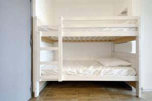 a white bunk bed in a room at Vu Mer by K6&You in Cassis +45 photos