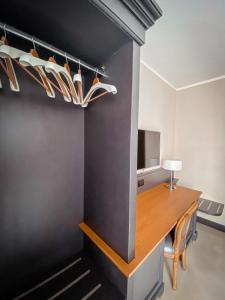 TV a/nebo společenská místnost v ubytování MH HOTEL VARAZZE