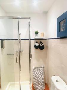 a bathroom with a shower and a toilet at GOLF & BEACH VILLA in Vale do Lobo +31 photos
