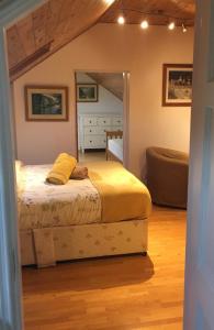 a bedroom with a bed in a room at Rugged Glen Accommodation in Glengarriff