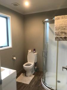 Et badeværelse på Modern Apartment by Rugby Stadium