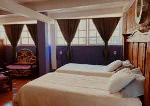 Säng eller sängar i ett rum på Casa de Pita