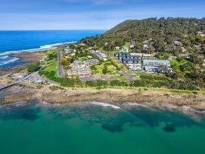 an aerial view of a resort near the ocean at Oceania 1 in Lorne