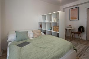 Postel nebo postele na pokoji v ubytování Symple apartments