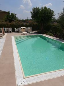 The swimming pool at or close to Villa Luisa Rooms and Breakfast